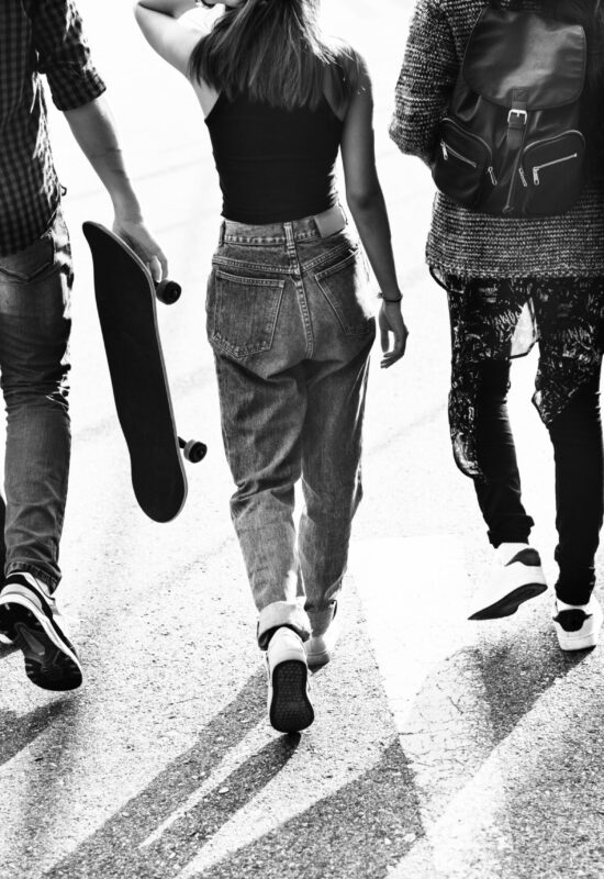 Group of diverse teenagers hanging out together